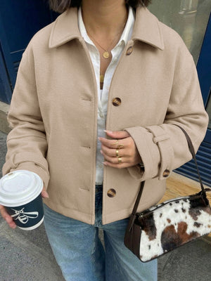Beige collared button-front jacket with long sleeves