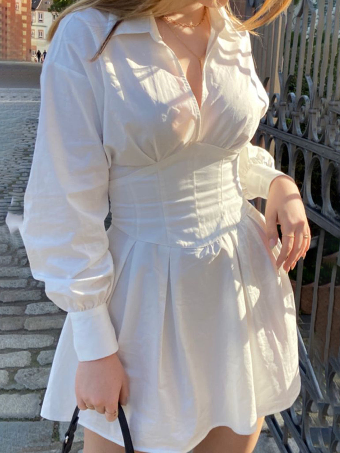 mini dress in white featuring ruched and A-line fit