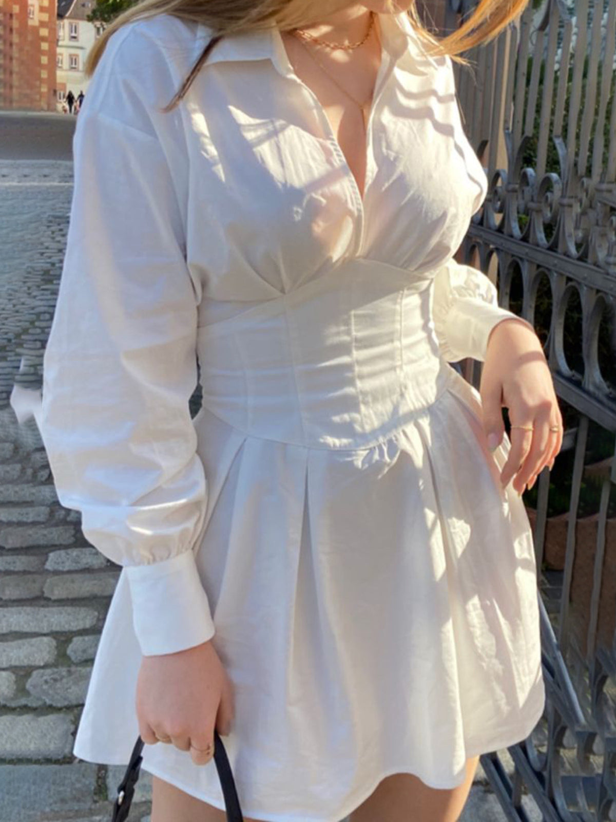 mini dress in white featuring ruched and A-line fit