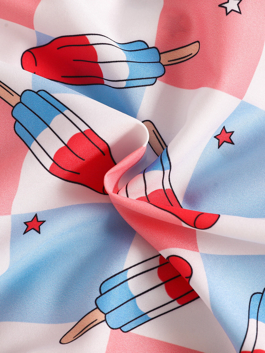 Baby bodysuit with popsicle print in red, white, and blue on a checkered background.