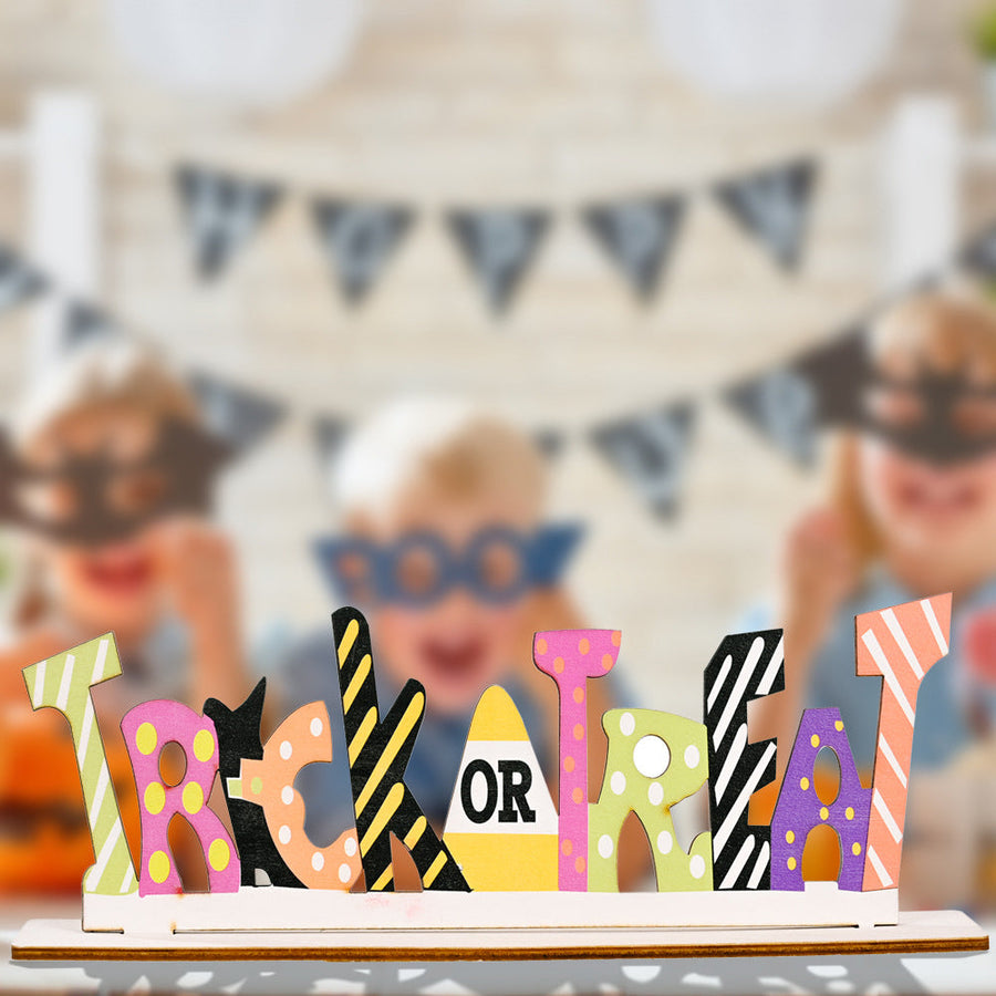 Halloween word block trio with Trick or Treat text in assorted colorful patterns and styles.