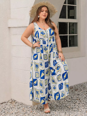 Plus-size relaxed jumpsuit with nautical print, V-neck, button front, and wide legs.