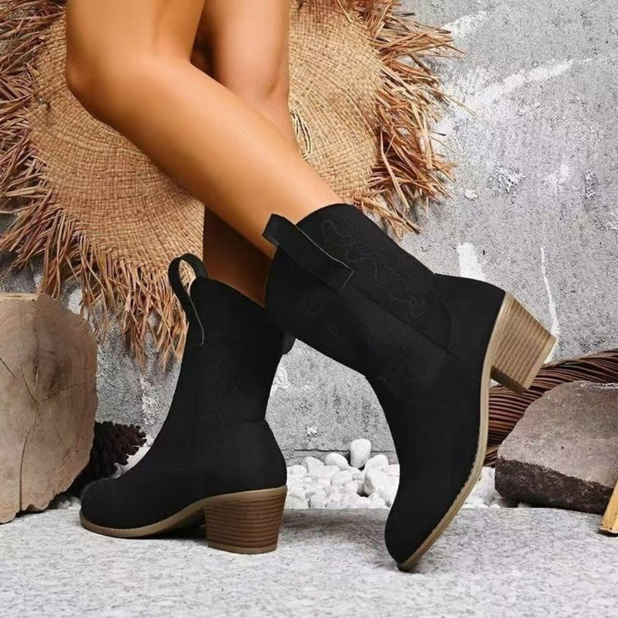 Black boots featuring block heel and embroidered