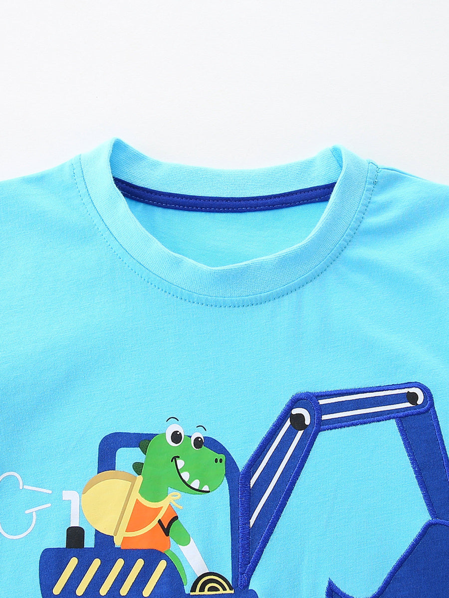 Boys' blue cotton t-shirt with a cartoon dinosaur driving an excavator graphic.