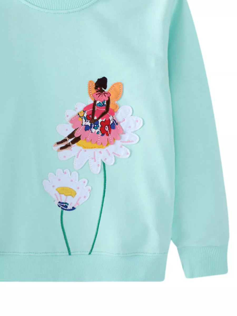 Aqua crew neck sweatshirt with embroidered fairy on flower applique.