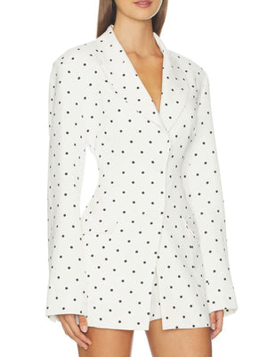100% polyester Care instructions: Machine wash cold blazer in white with fitted silhouette