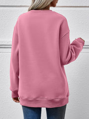 Blush Pink polyester drop shoulder sweatshirt with crew neck and cuffed hem.