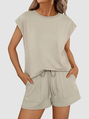 Relaxed fit drawstring short set in Khaki with cap sleeves and patch pockets.