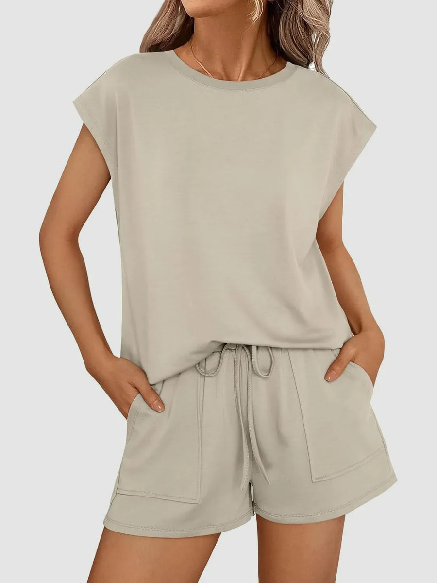 Relaxed fit drawstring short set in Khaki with cap sleeves and patch pockets.
