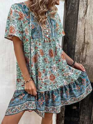mint green mini dress with floral and v-neck