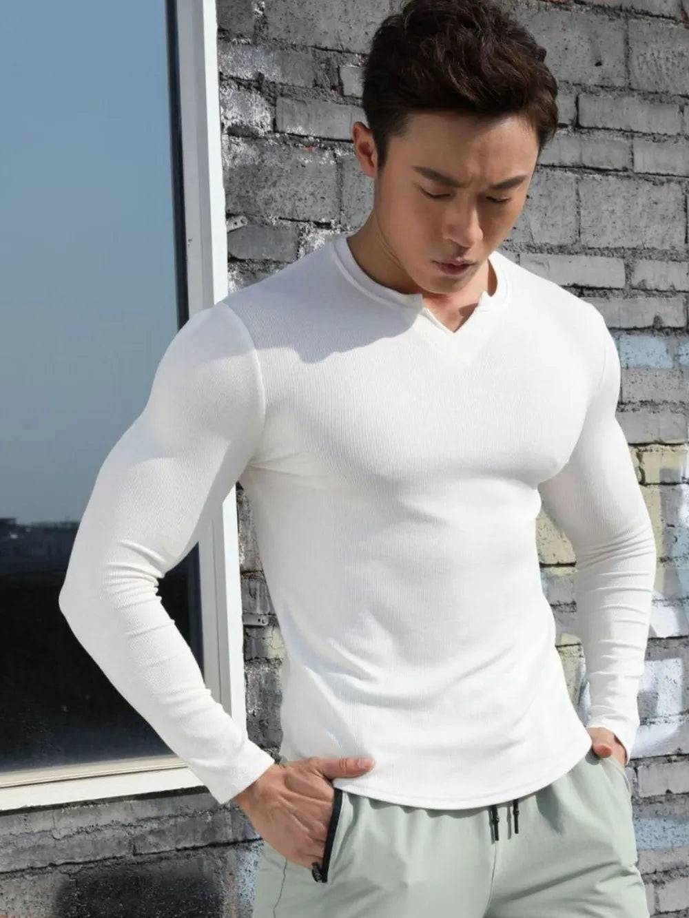White ribbed long sleeve t-shirt with V-neck