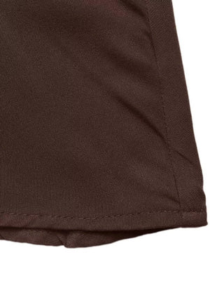 Brown A-line midi dress hem detail with visible stitching and textured fabric.