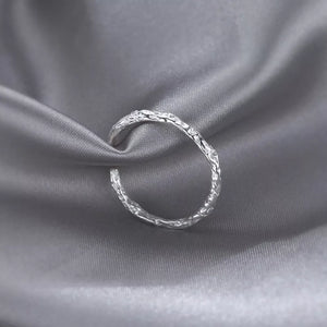 925 sterling silver Care instructions: Avoid wearing during exercise, as sweat w ring in silver with open silhouette