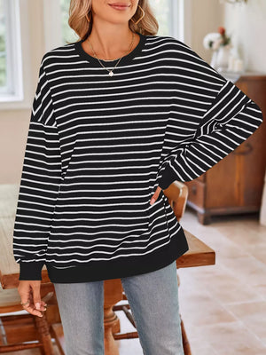 white sweatshirt featuring stretch and striped