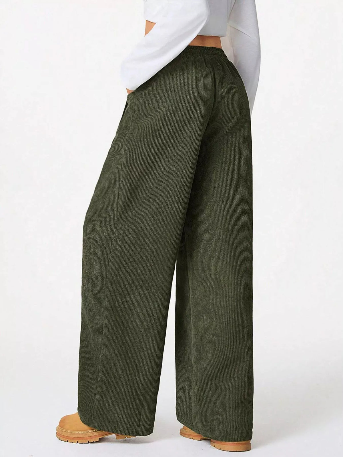 Relaxed fit army green corduroy drawstring pants with a wide leg