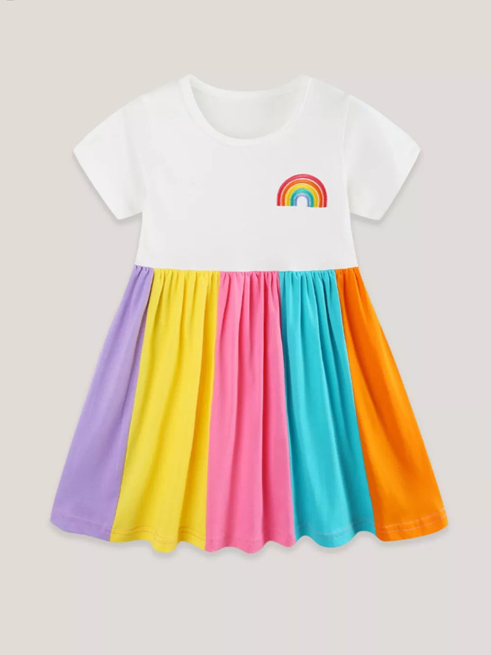 White toddler dress with rainbow embroidery and a colorful striped skirt.