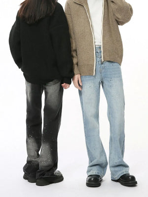 Light wash flare jeans with splatter detail and double waistband