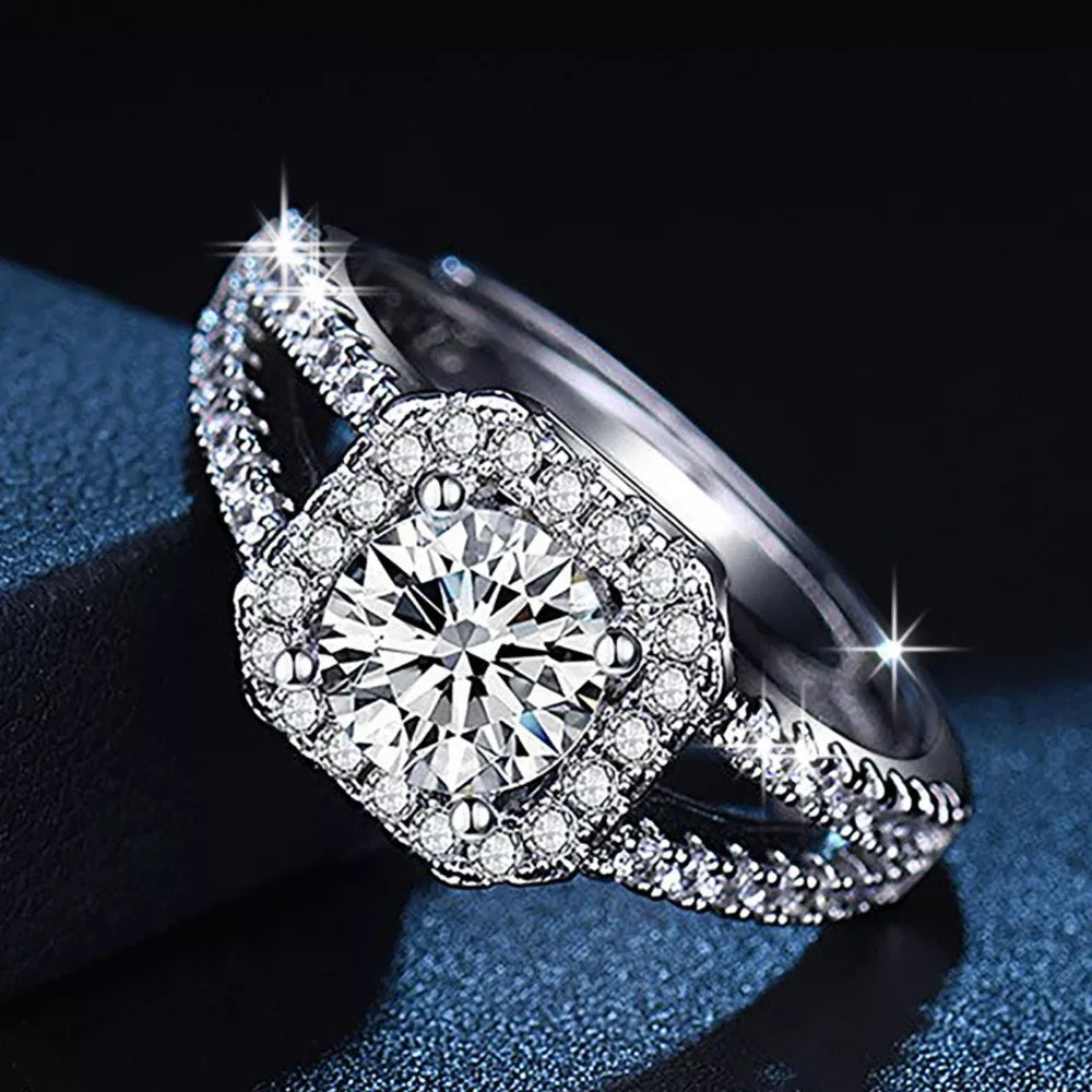 925 sterling silver,Moissanite Carat weight: 1ct Care instructions: Avoid wearin ring in clear with classic silhouette