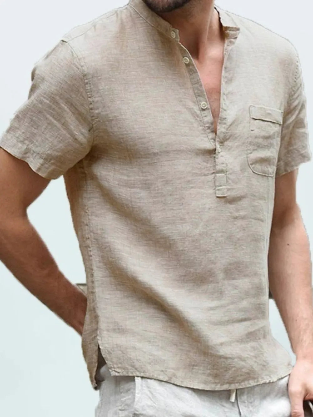 Linen henley shirt in Khaki with short sleeves, band collar, and chest pocket.