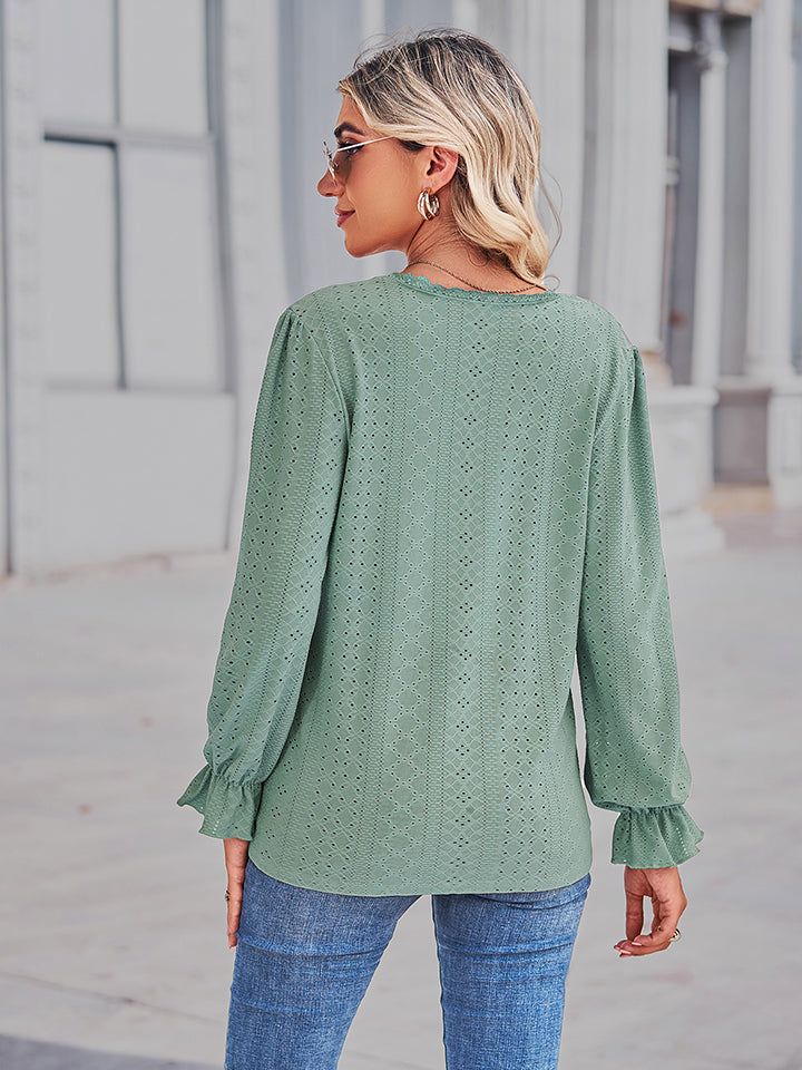 Lace-cut prairie blouse in Gum Leaf with ruffled sleeves and eyelet pattern.