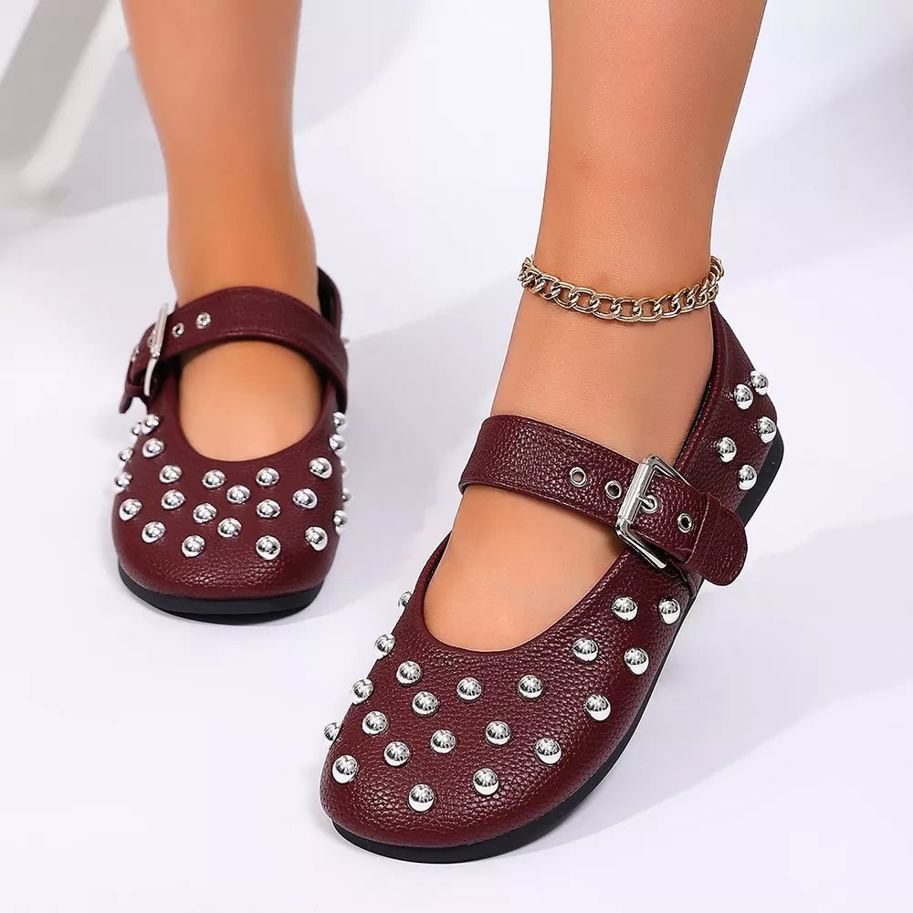 Mary Jane flats in burgundy featuring studded and round toe fit