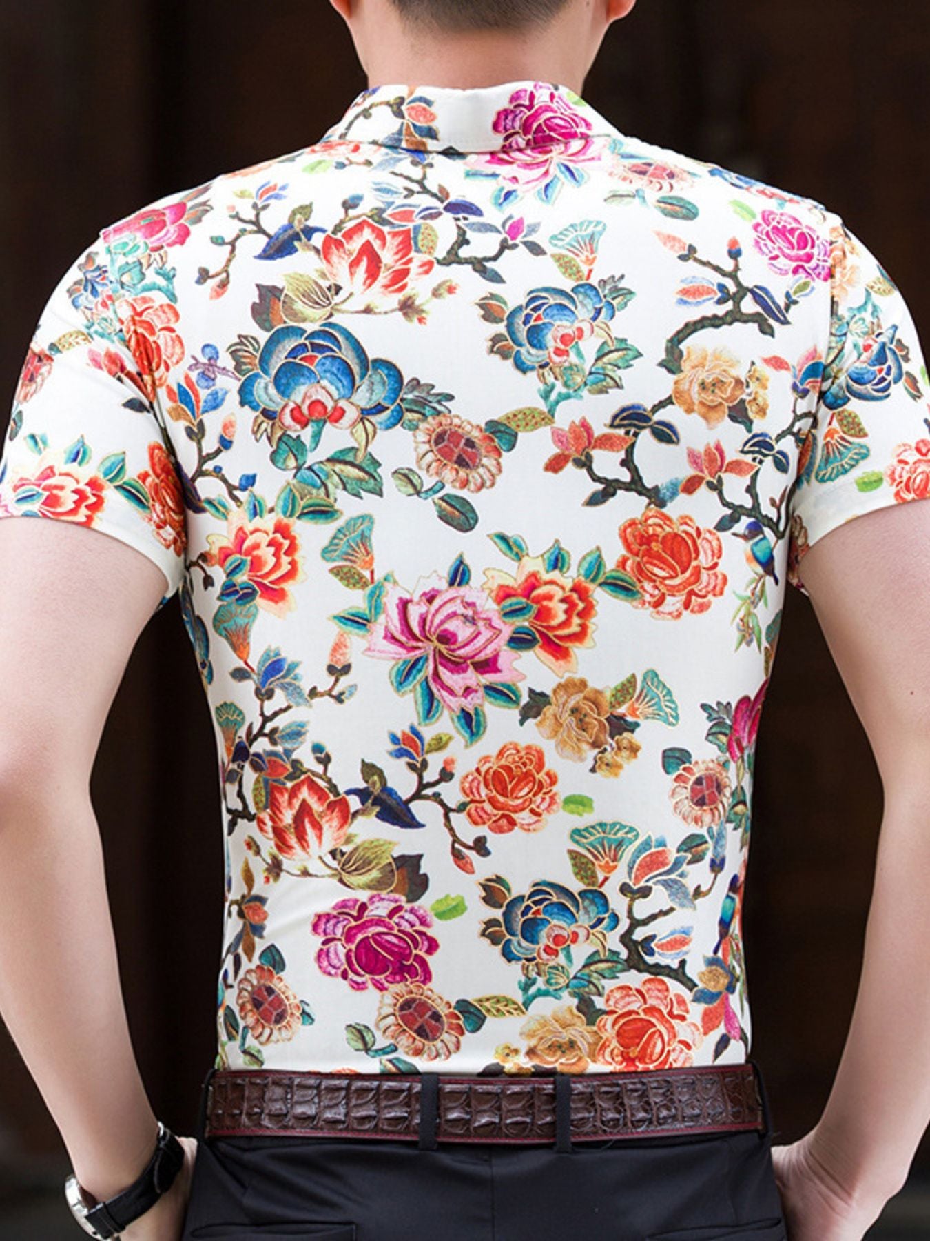Men's white cotton short sleeve button-down shirt with vibrant floral print.