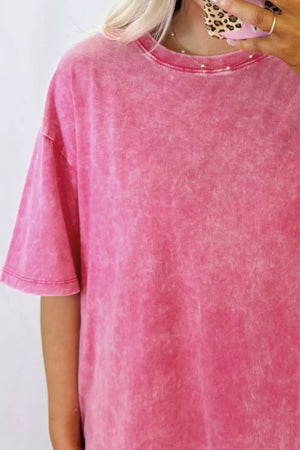 Vibrant pink mineral-washed cotton t-shirt with relaxed fit and pearl-embellished neckline.