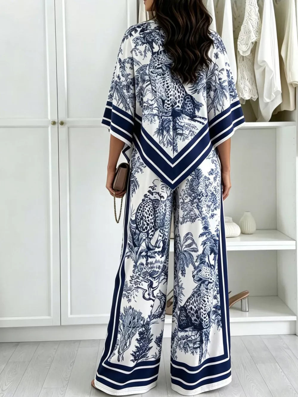 navy blue two-piece set featuring asymmetrical and leopard-print