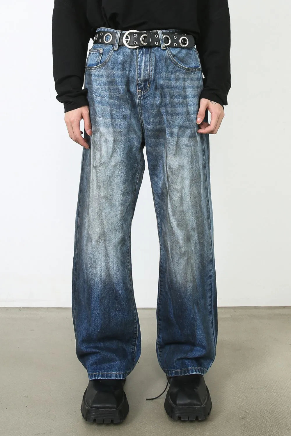 Faded ombre wide-leg jeans in medium blue denim with a relaxed fit.