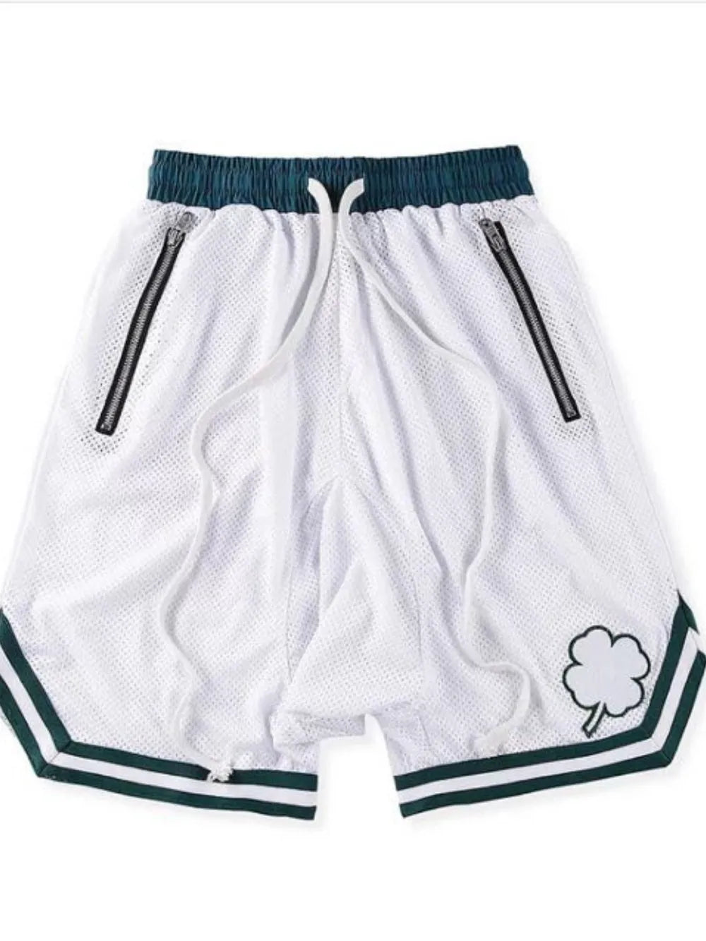 White mesh basketball shorts with dark green trim, drawstring, and zipper pockets.