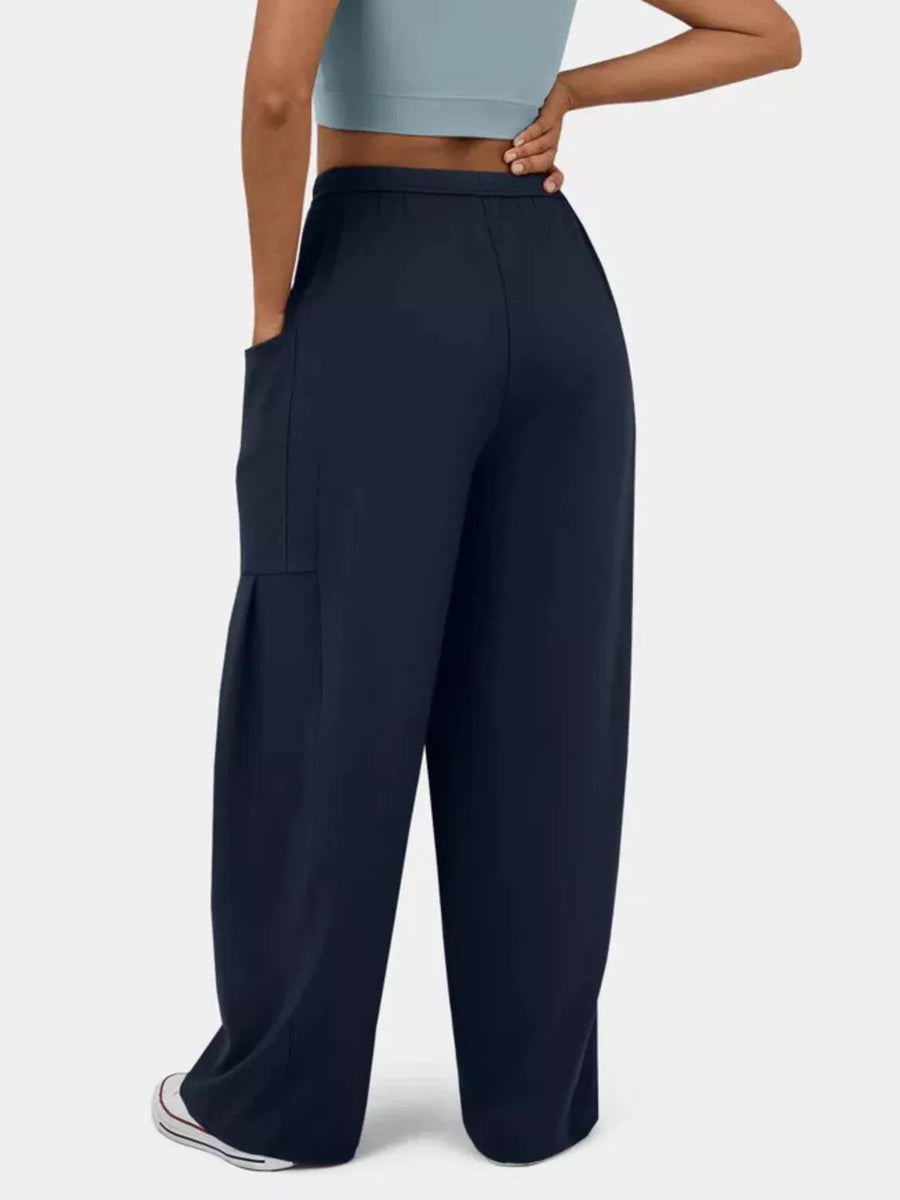 Dark Blue maternity pants with wide legs and cargo pocket detail.