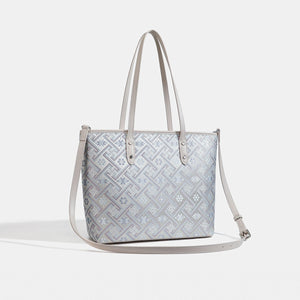 tote featuring geometric in Light Blue with Faux leather Imported Size &amp texture