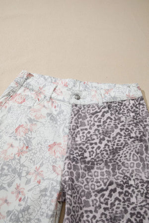 Floral and leopard print wide-leg jeans with a high waist and button closure.