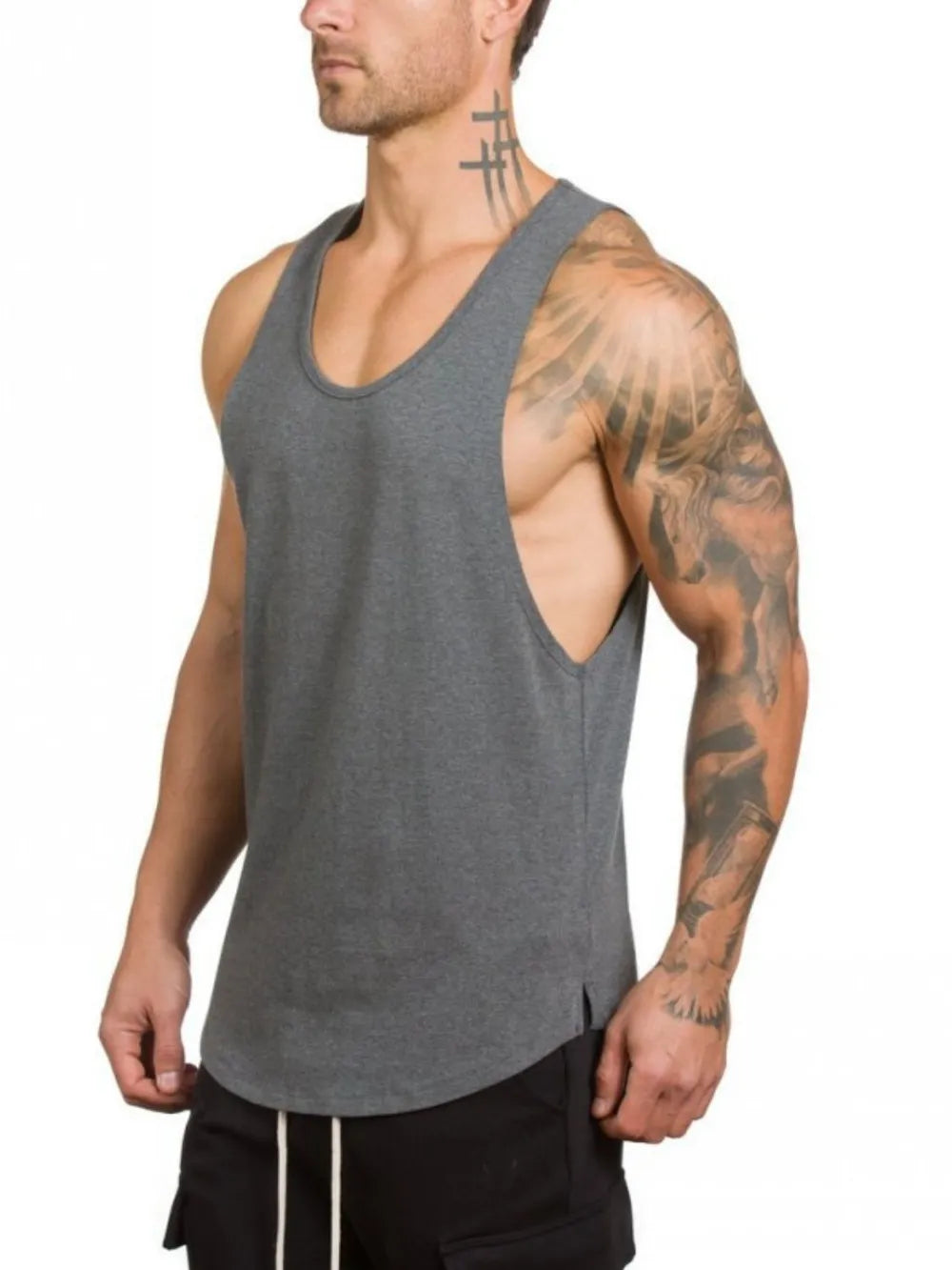 Dark Gray scoop neck muscle tank top with curved hem and side slits.