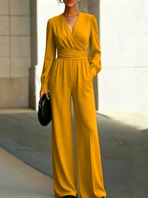 100% polyester Care instructions: Machine wash cold jumpsuit in Yellow with flared silhouette