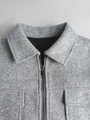 slate gray zip-up jacket with zipper and long sleeve