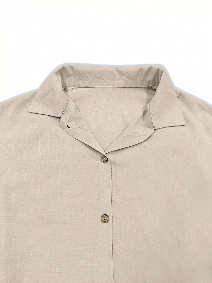 beige button-up shirt with ruffled and flounce sleeve