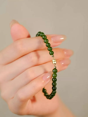 Agate Care instructions: 1 bracelet in Dark Green with fitted silhouette