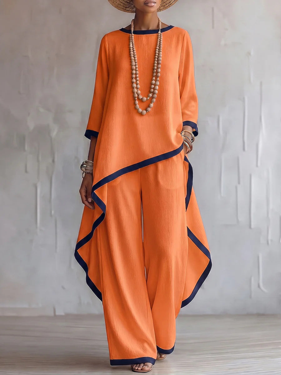 Blue two-piece set with tunic-length top, full-length pants and pullover