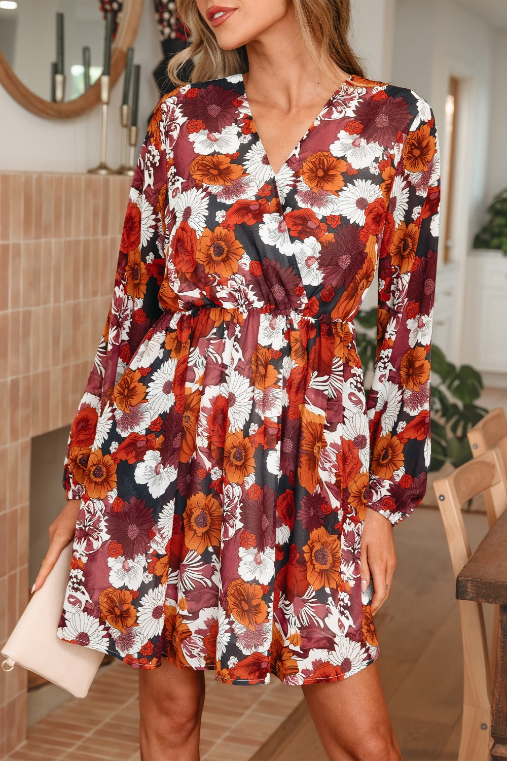 Floral wrap mini dress with puff sleeves in autumn floral print, v-neck, long sleeves.