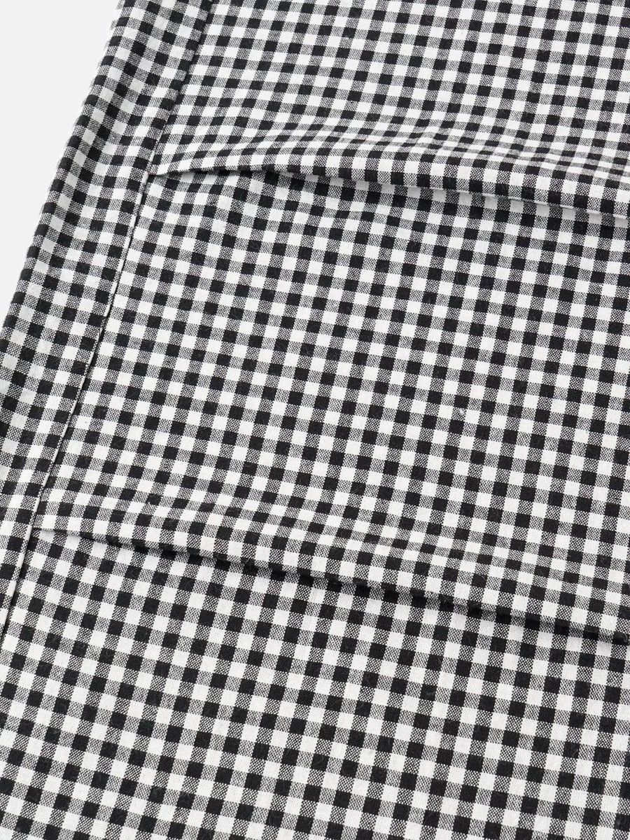 Black wide-leg pants featuring drawstring waist and gingham