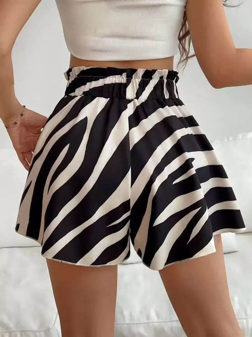 shorts featuring leopard-print in Apricot with 100% polyester Care instructions: Machine wash cold texture
