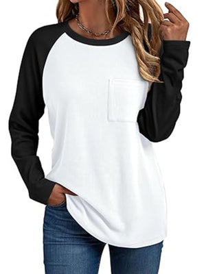 Pocketed round neck long sleeve t-shirt with black sleeves and white body.