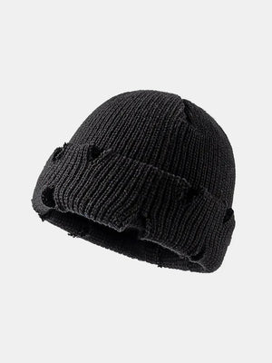 Black distressed ribbed knit beanie with frayed edges