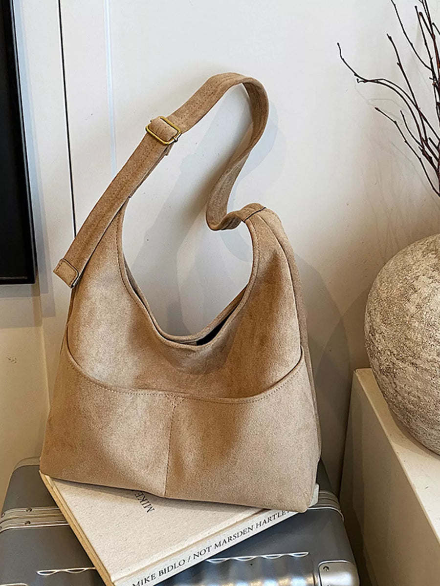 Large Khaki Suede Shoulder Bag with adjustable strap and front pocket detail.