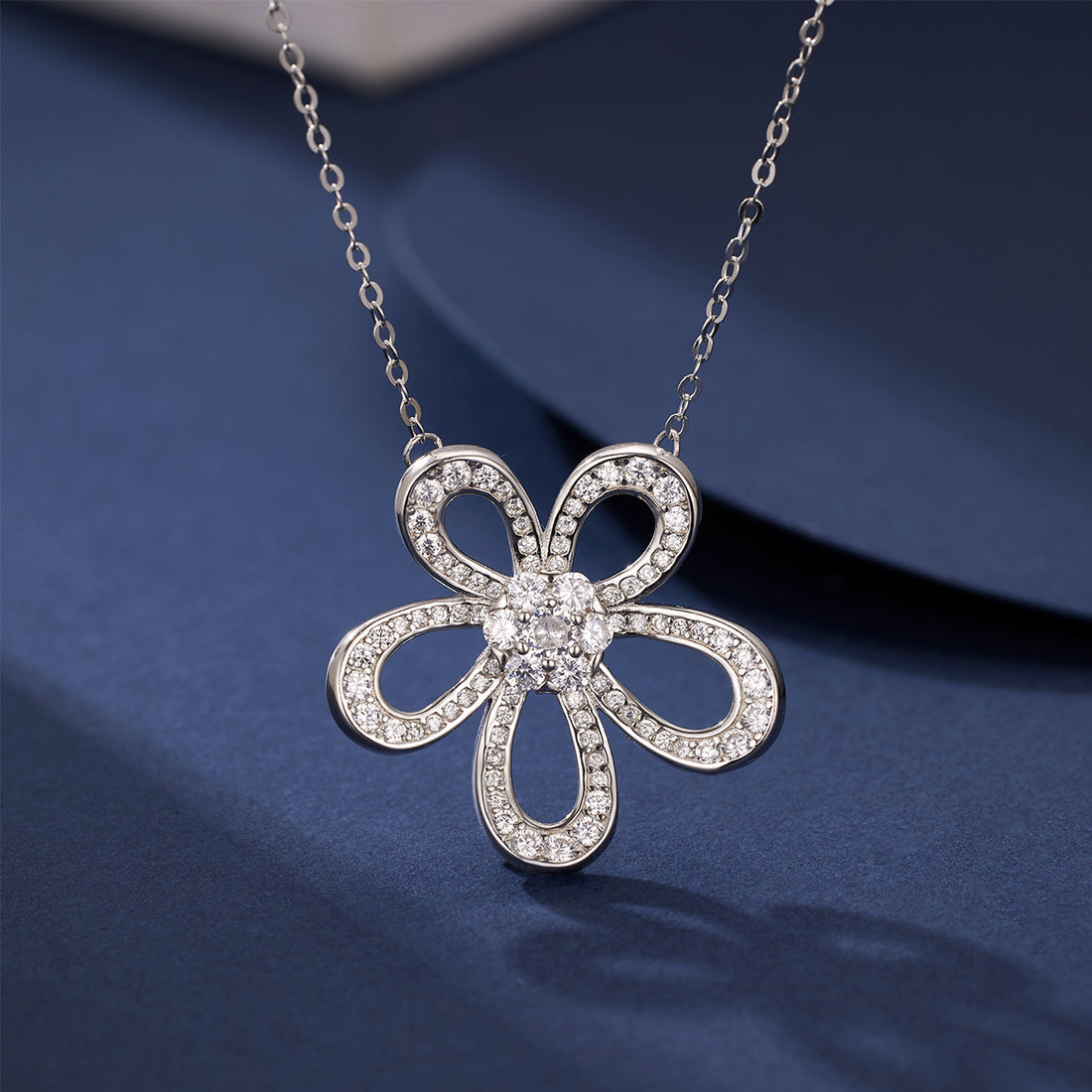 necklace in silver featuring flower pendant and pendant necklace fit