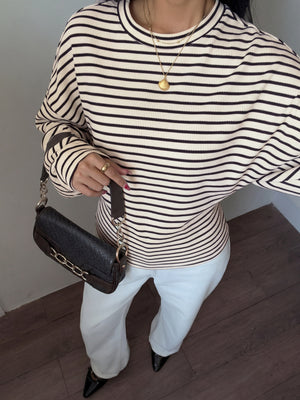 beige t-shirt featuring stretch and striped