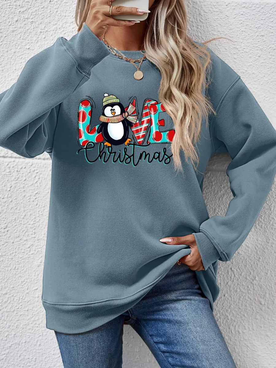 Air Force Blue sweatshirt with festive penguin graphic and "LOVE Christmas" text