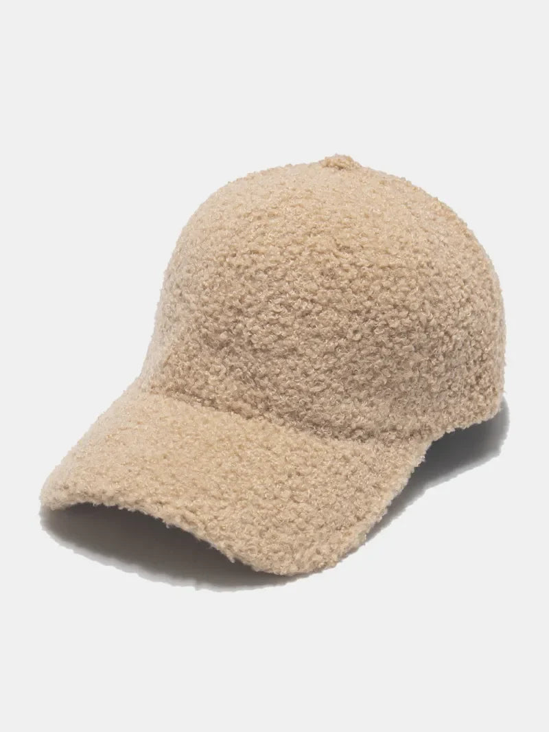 Textured sherpa baseball cap in khaki with adjustable strap.