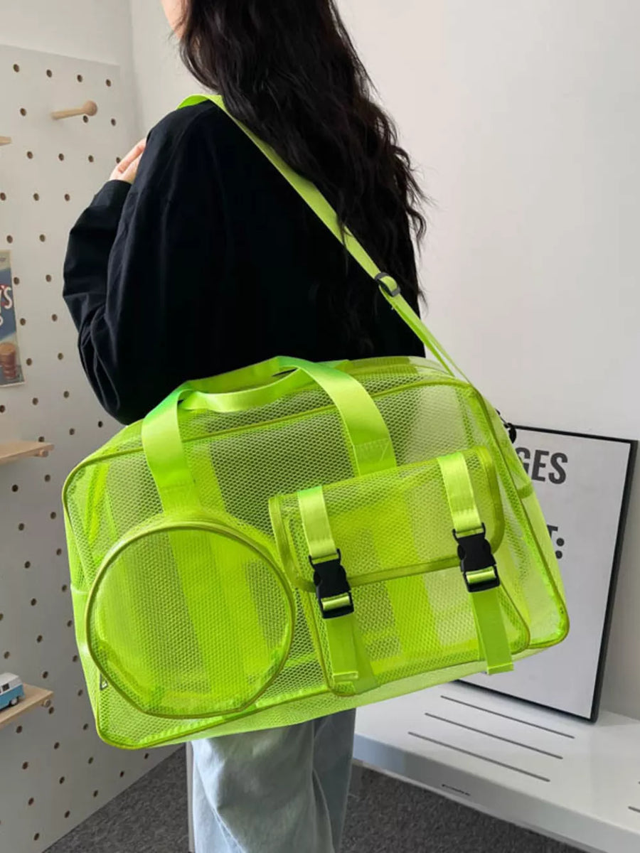 Fluorescent green mesh travel organizer bag with multiple pockets and a round side pouch.